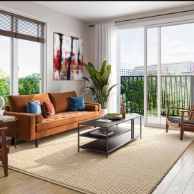 Spacious living areas to recline and recharge a living room with a large window